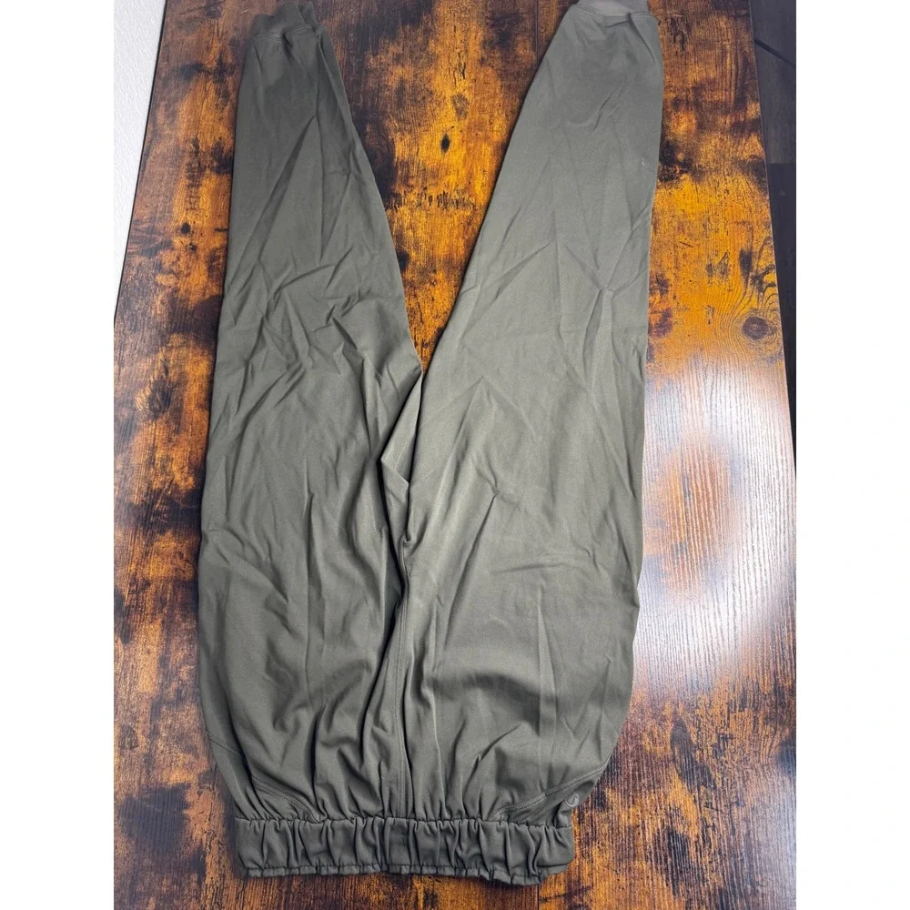 Lululemon On the Fly Jogger Pants Olive Green‎ Drawstring Elastic Waist Women 4